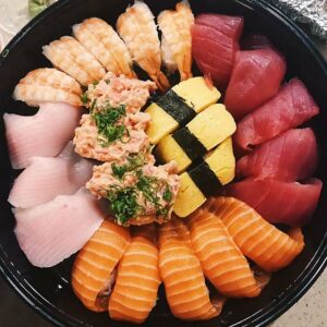 A tray of assorted sushi